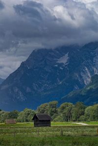 Scenic view of landscape and mountains against sky