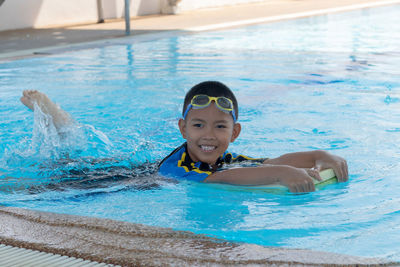 Portrait of girl in swimming pool