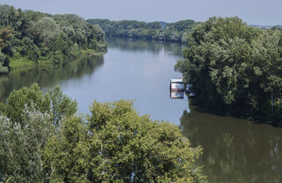 Scenic view of lake by trees