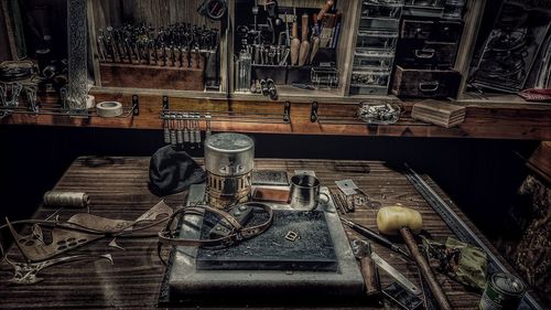 High angle view of old bottles on table