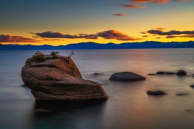 Scenic view of sea against sky during sunset