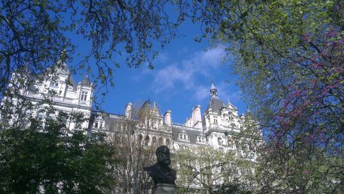 Low angle view of built structure against blue sky
