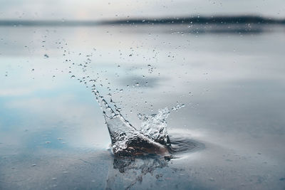 Close-up of water splashing in sea
