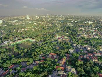 Aerial view of cityscape against sky