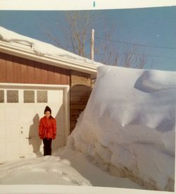 People standing on snow covered landscape