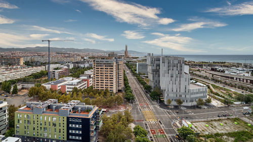 High angle view of buildings against sky