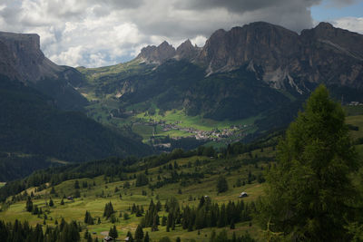 Scenic view of landscape and mountains against sky