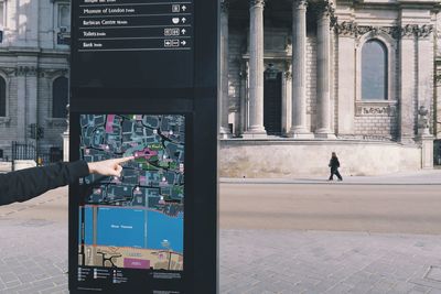 Woman standing in city