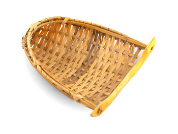 High angle view of wicker basket on white background