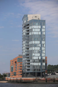 Modern building against sky in city