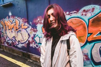 MID SECTION OF WOMAN IN HAIR