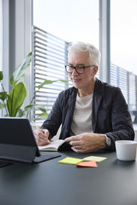 Businessman sitting in office