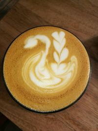 High angle view of cappuccino on table