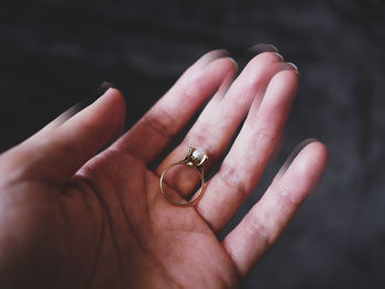 Close-up of hand holding hands