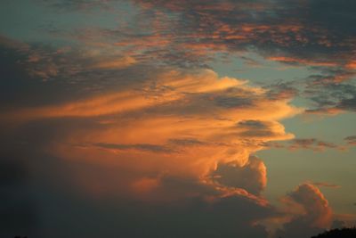 Low angle view of clouds in sky during sunset