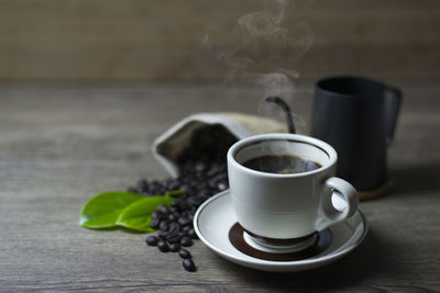 Close-up of coffee cup on table