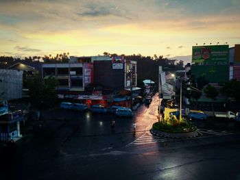 High angle view of buildings against sky at sunset