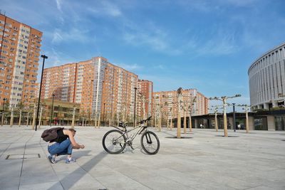 Man cycling on bicycle in city