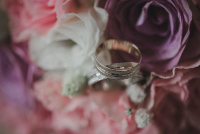 Close-up of rings in bouquet