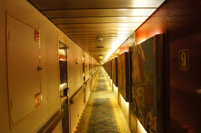 Illuminated corridor of building