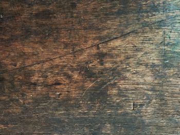 Full frame shot of weathered wooden table