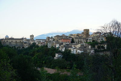 Houses against clear sky