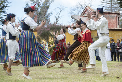 Group of people dancing on stage