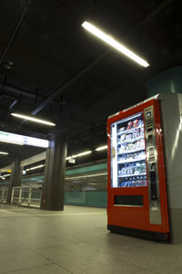 Information sign in illuminated subway station