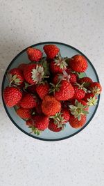 High angle view of strawberries on table