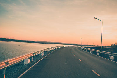 Empty road at sunset