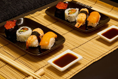 High angle view of sushi served on table