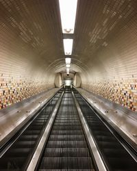 Interior of illuminated subway station