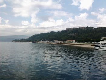 Scenic view of sea against cloudy sky