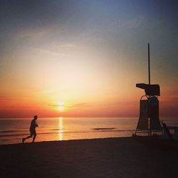 Scenic view of sea at sunset