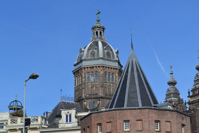 Low angle view of cathedral against blue sky
