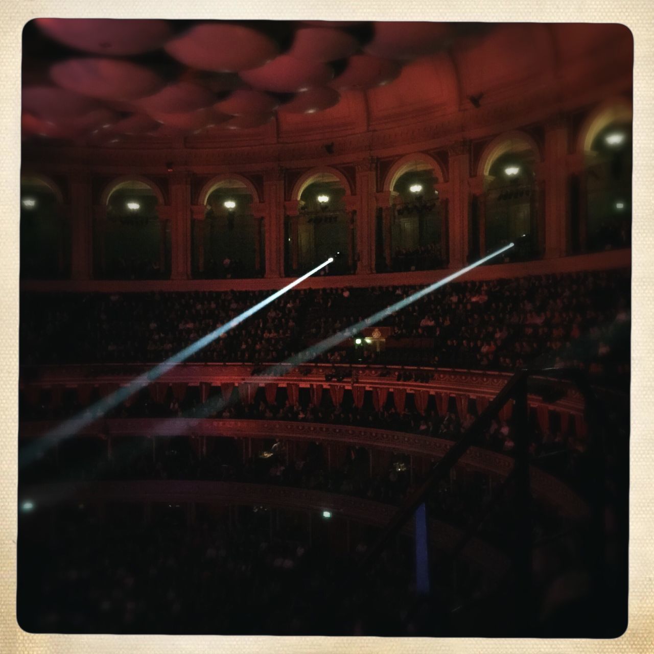 ILLUMINATED RED LIGHTS IN DARK ROOM