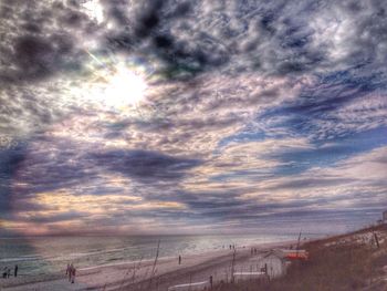 Scenic view of sea against cloudy sky