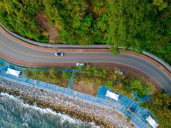 High angle view of road amidst trees