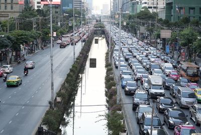 High angle view of cars on street in city