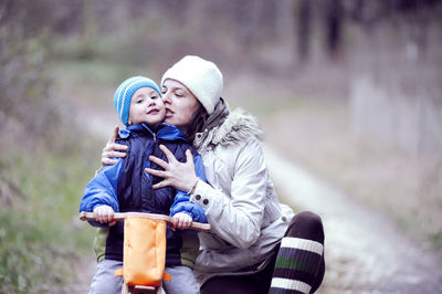 Happy mother and daughter in park