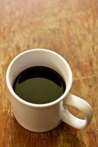 Close-up of coffee cup on table