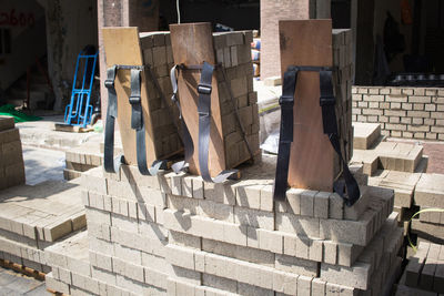 Row of clothes hanging on wall