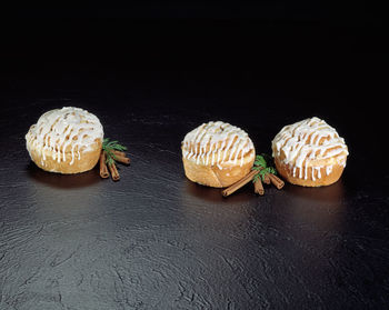 Close-up of candies against black background