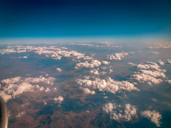 Aerial view of cloudscape against blue sky