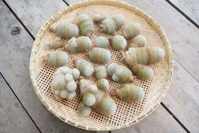 High angle view of eggs in basket on table