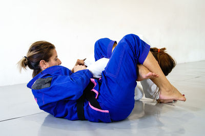 Women lying down on floor