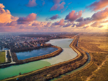 High angle view of cityscape against sky during sunset