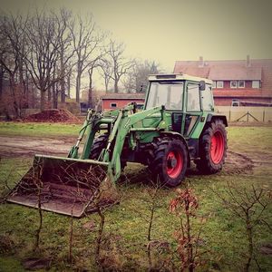 Tractor on grassy field