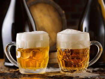 Close-up of beer glass on table