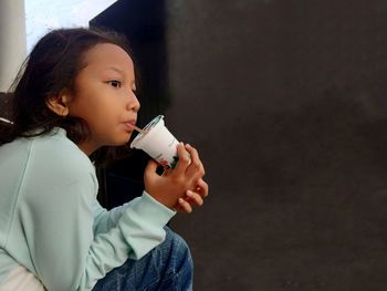 Portrait of a girl looking away